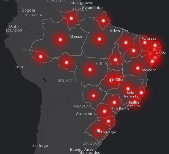 Captura de tela de mapa dos casos de coronavírus - COVID-19 no Brasil, com basemap escuro e pontos em vermelho indicando as localidades clicáveis