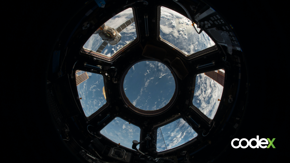 Visão da terra vista do espaço, através de sete pequenas janelas de um satélite.